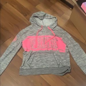 A LG pink brand sweater